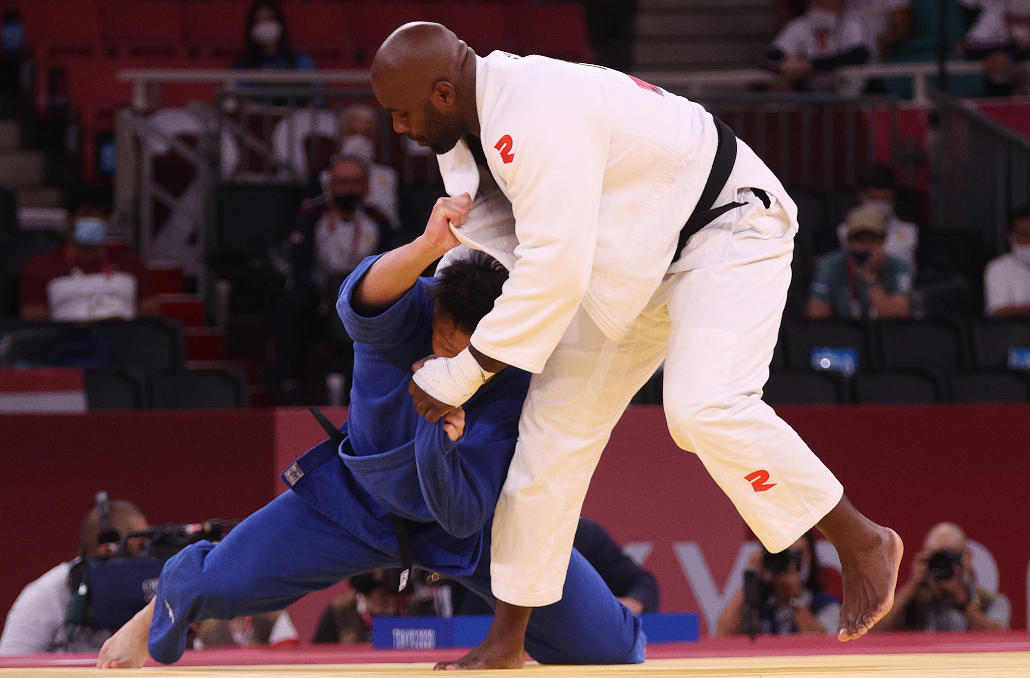 Teddy Riner, right, opted not to compete at the 2022 World Judo Championships due to an ankle injury ©Getty Images