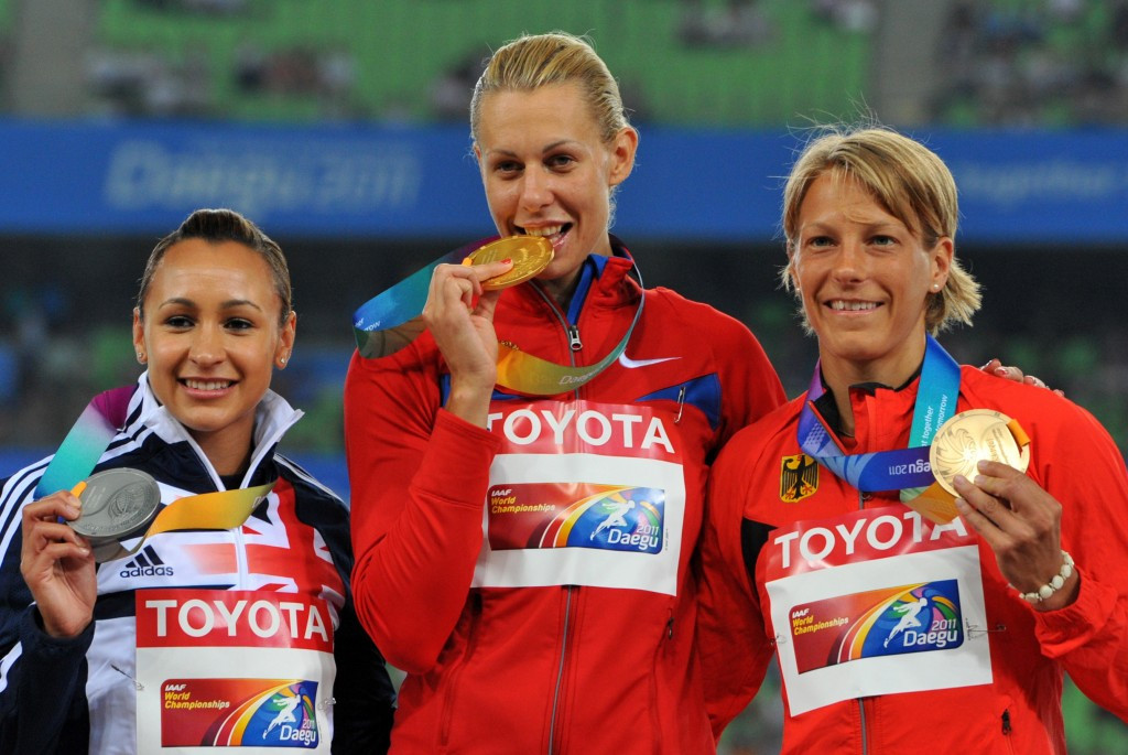 Tatyana Chernova (centre) won gold at the 2011 World Championships but has not yet been stripped of that title ©Getty Images