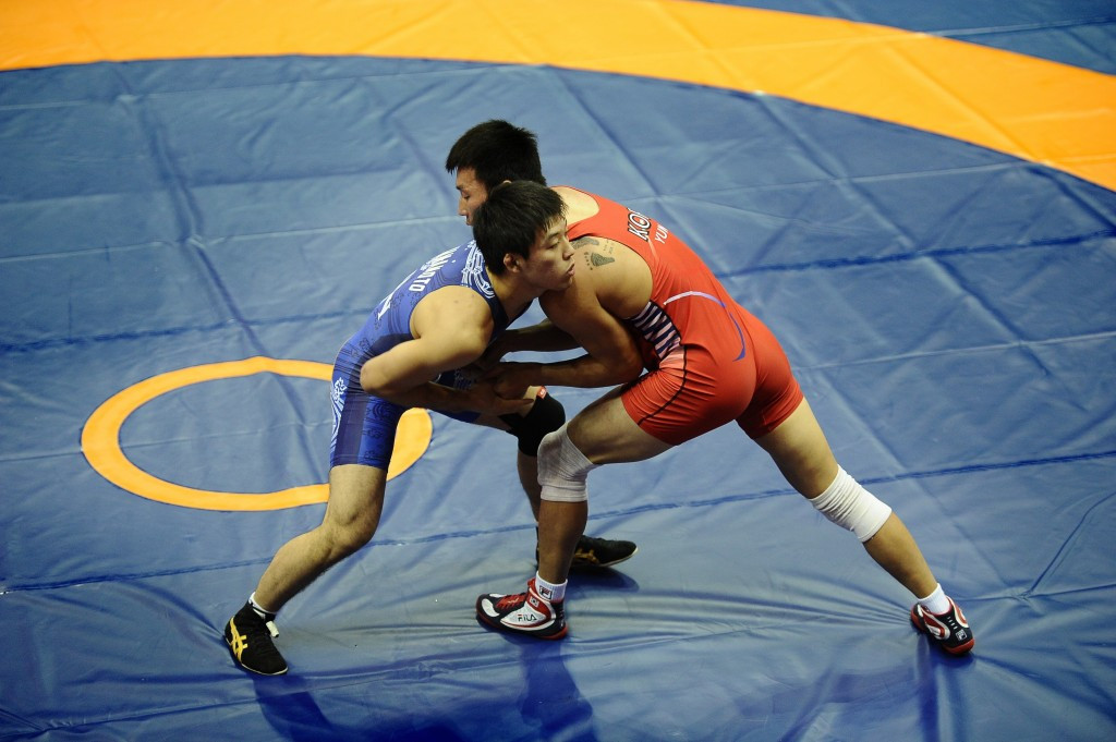 Wrestling to no longer insist on red and blue uniforms