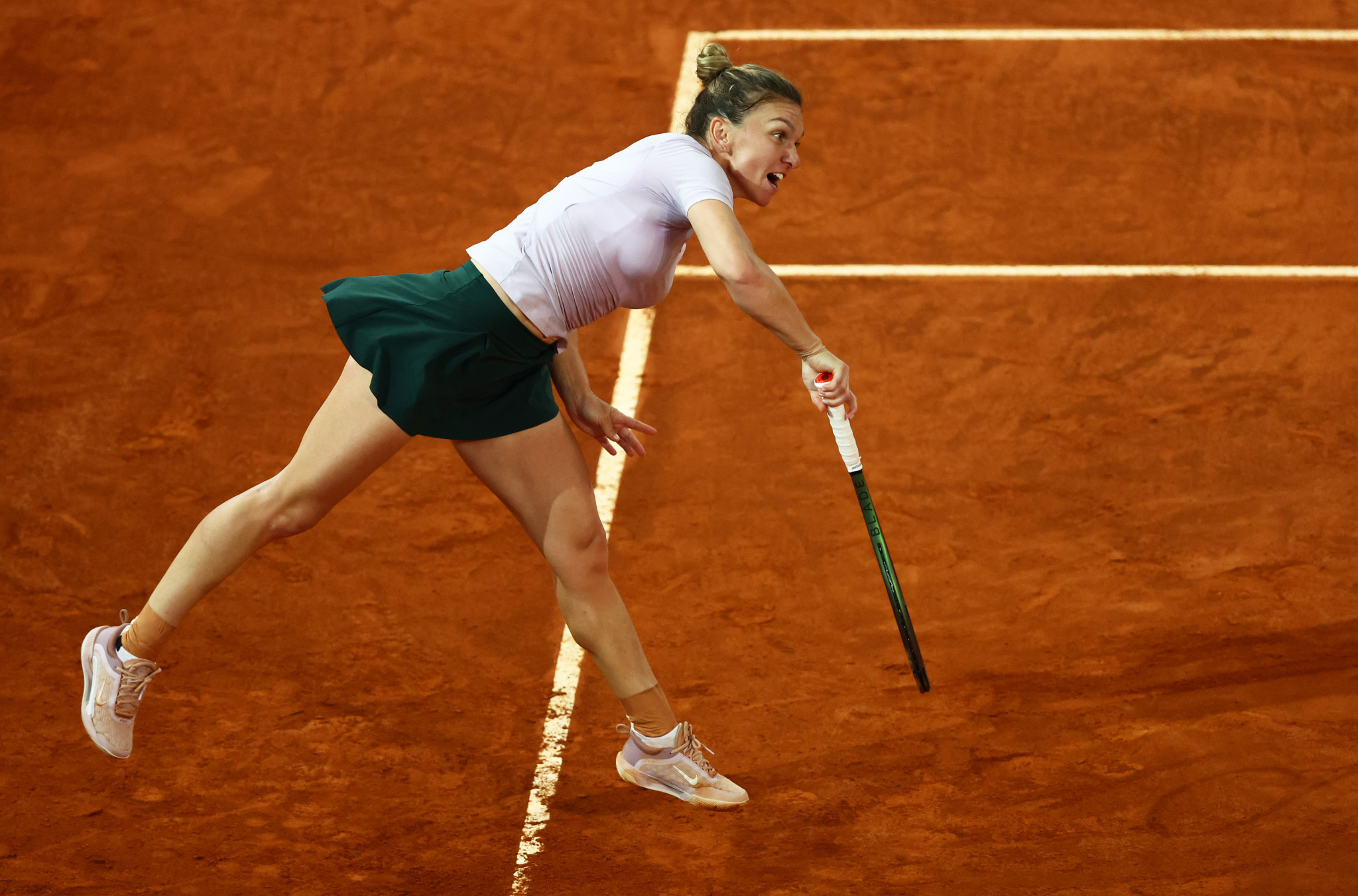 Simona Halep is in the final eight of the Madrid Open after beating Coco Gauff ©Getty Images