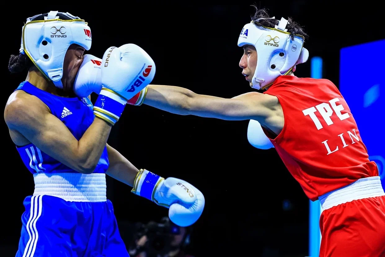 Chinese Taipei's Lin Yu-ting. in red, came from a round down to defeat France's Sthelyne Grosy ©IBA