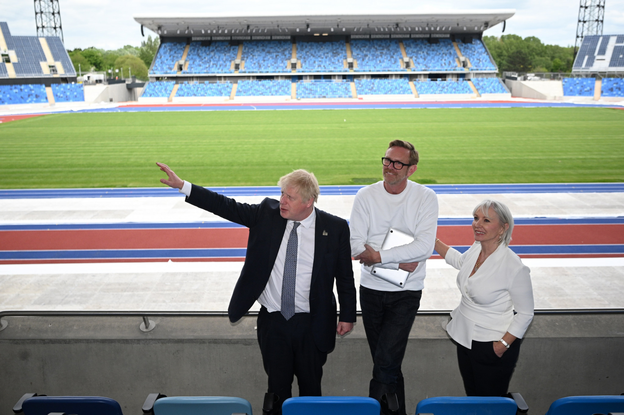 British Prime Minister Boris Johnson, left and Culture Secretary Nadine Dorries, right, with Birmingham 2022 chief creative officer Martin Green ©Getty Images