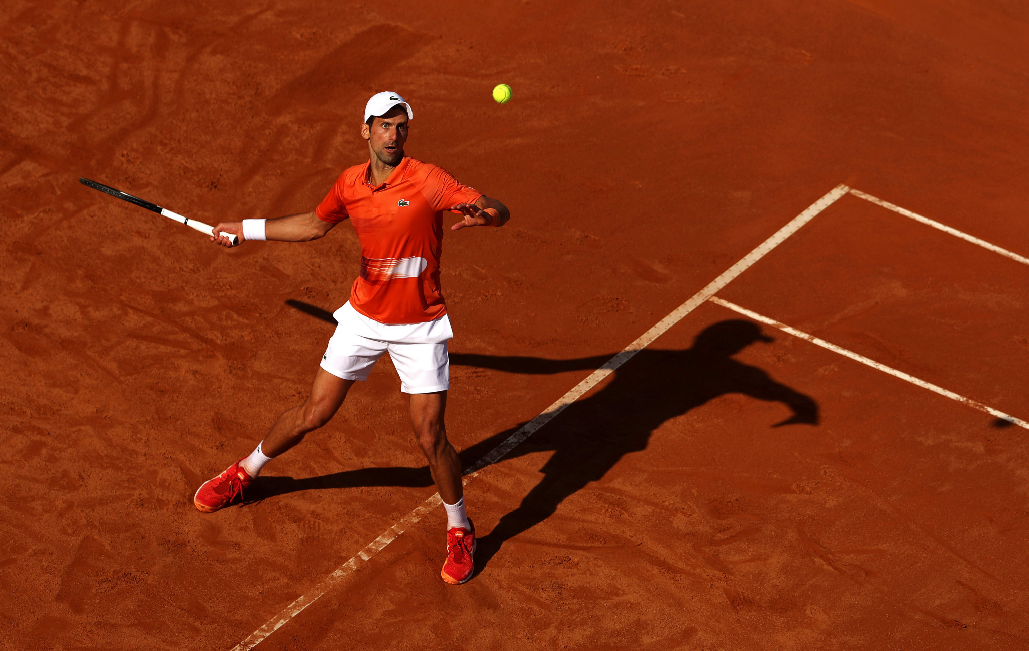 Top seeds Djokovic and Świątek lay down marker for French Open with victories in Italy