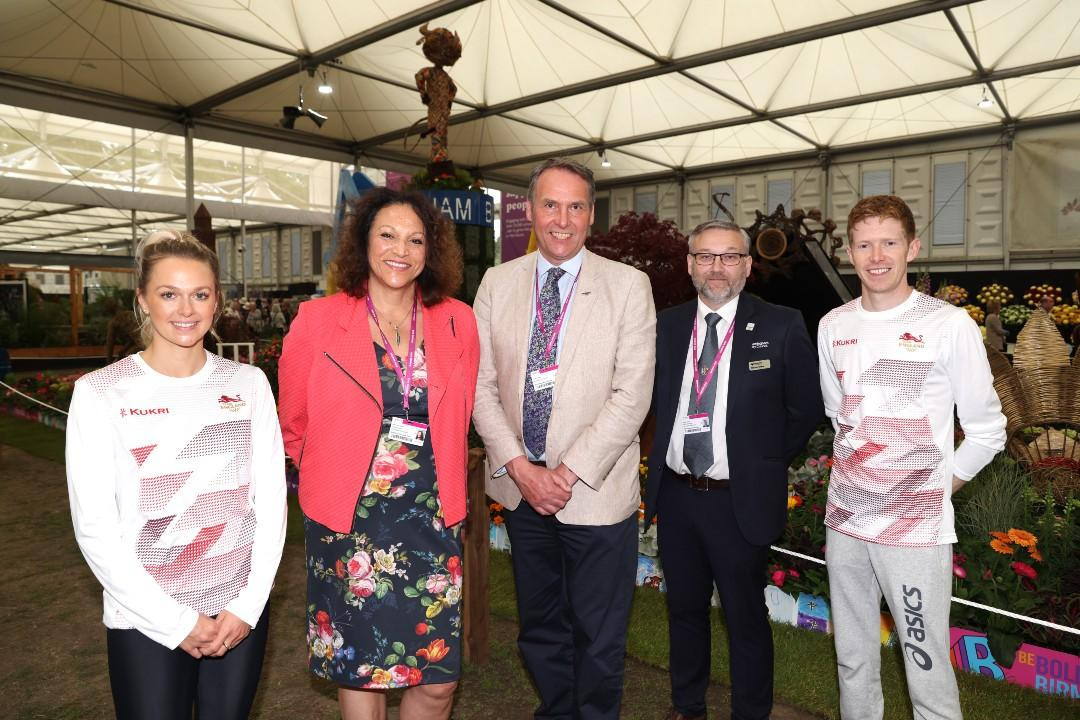 Commonwealth Games medallists, diver Tonia Couch, left, and race walker Tom Bosworth, right, flank  Birmingham Council representatives at the Chelsea Flower Show ©Birmingham Council 