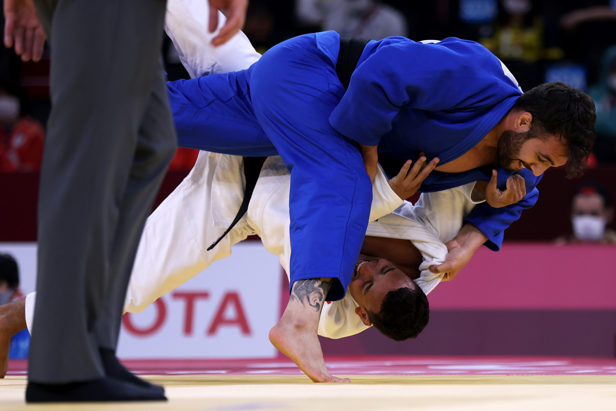 Home favourite Zhanbota Amanzhol, in white, will look to claim gold in the under-90kg category ©Getty Images