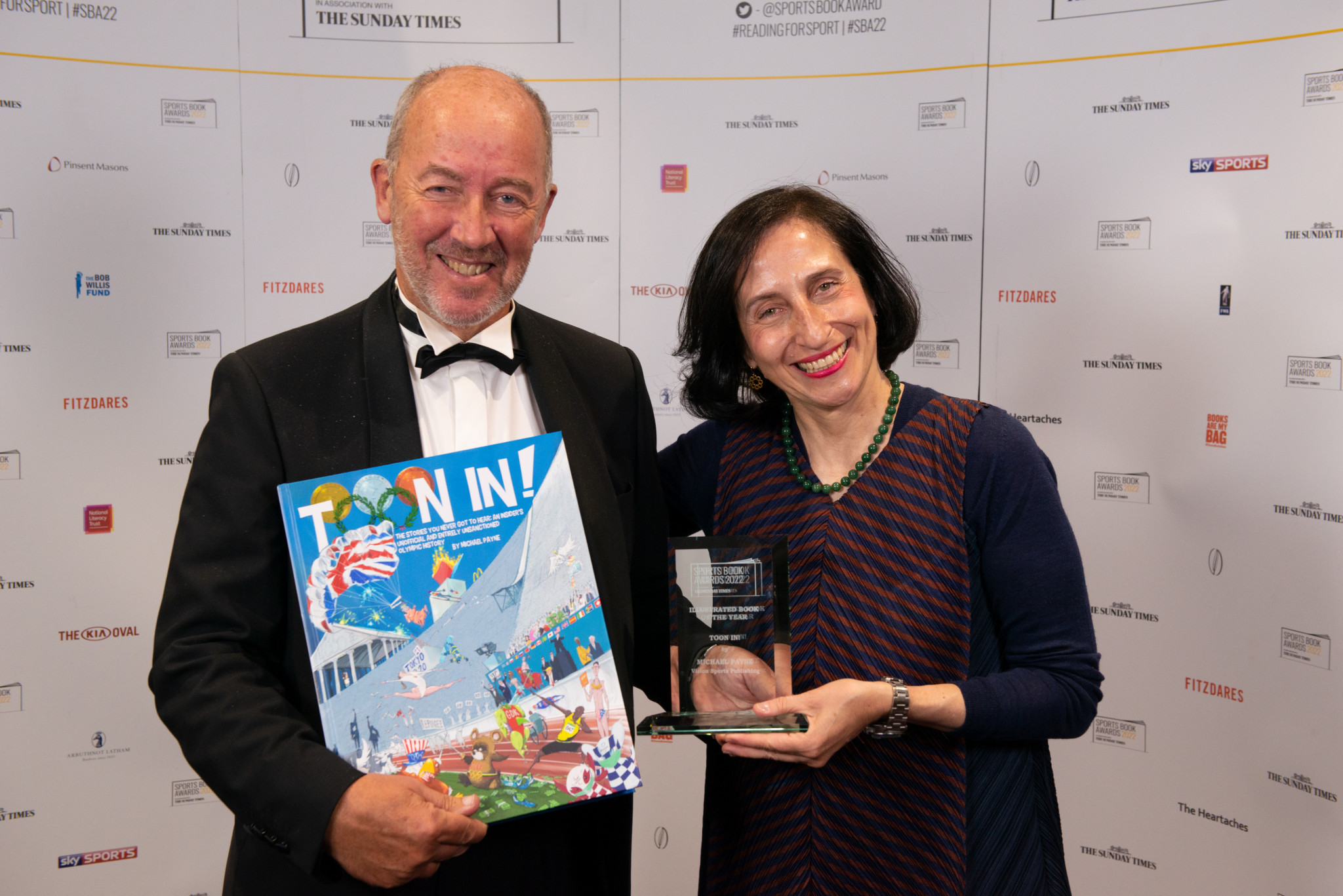 Michael Payne, pictured with designer Theodora Mantzaris, receives his award