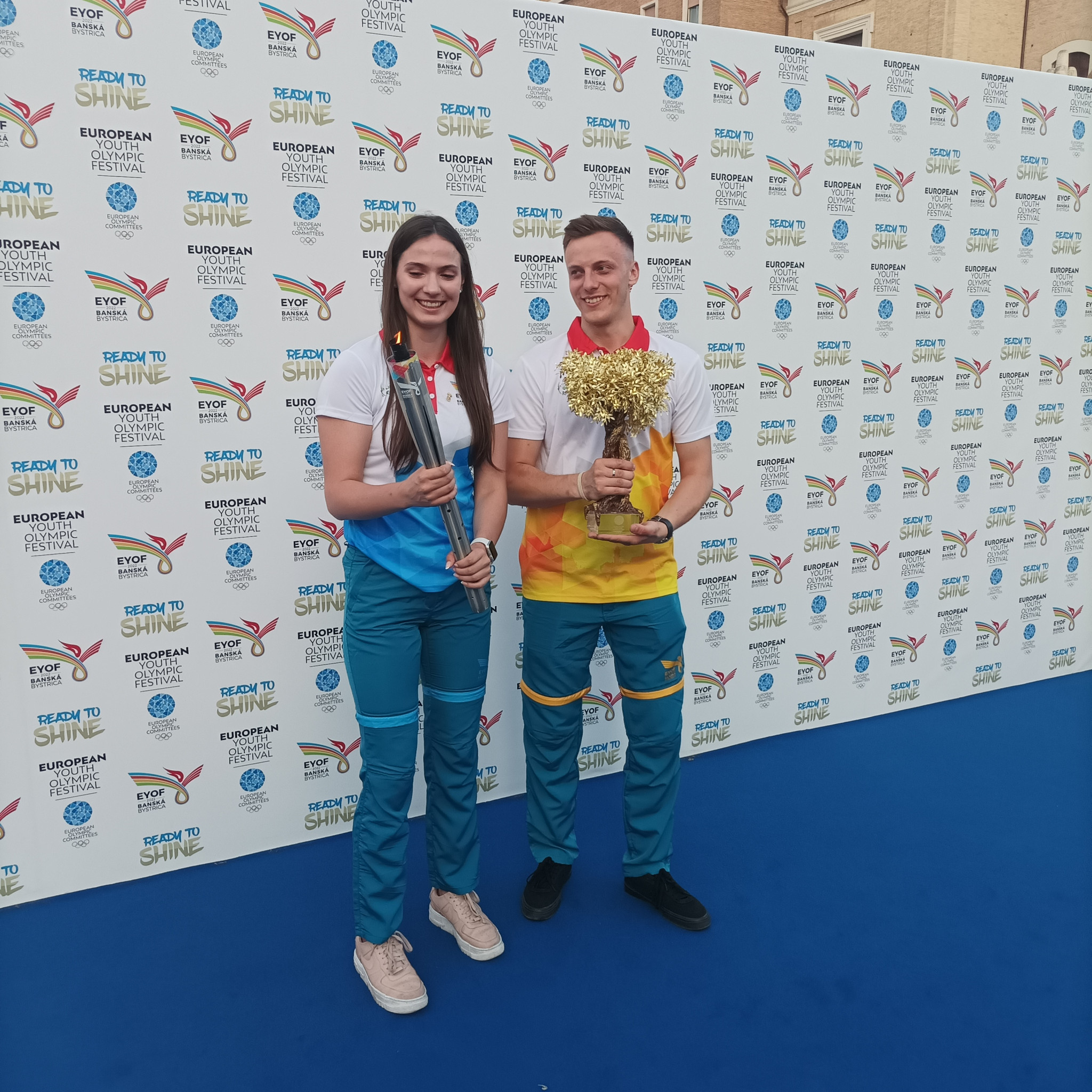 Seventeen-year-old volleyball player Alexandra Fričová and volunteer Tomas Kubica brought the Flame to the Ara Pacis  ©ITG