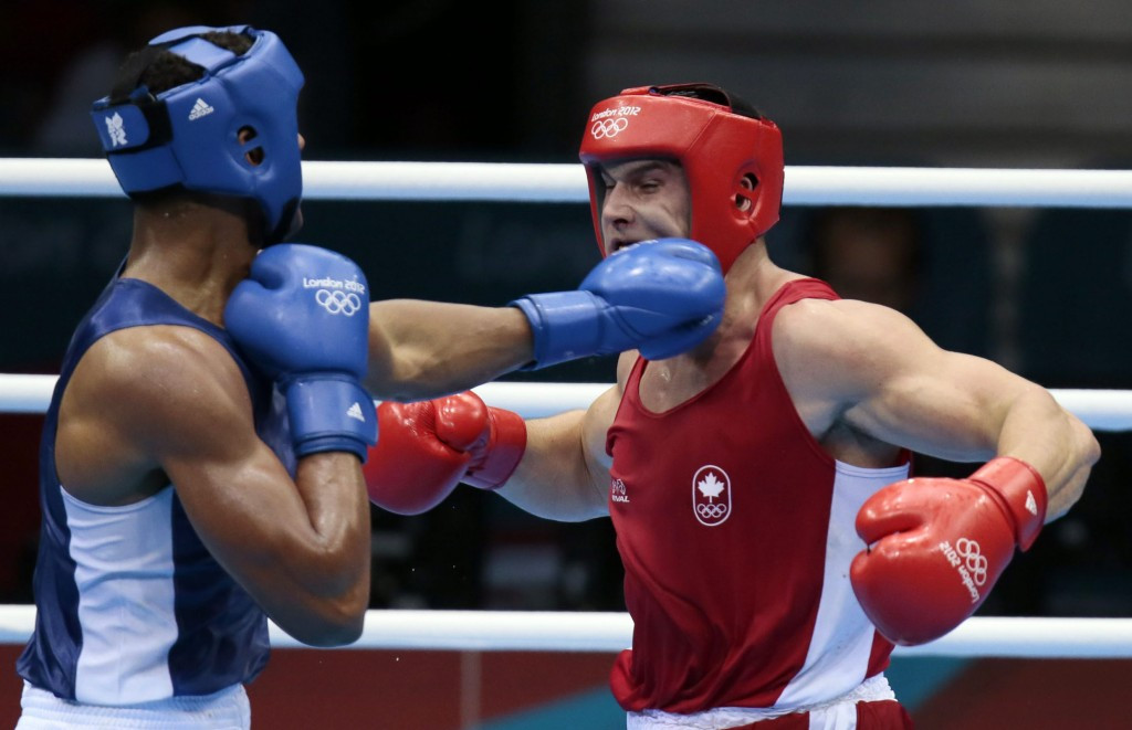 Under AIBA President C K Wu, headguards have been removed for men's Olympic boxing ©Getty Images