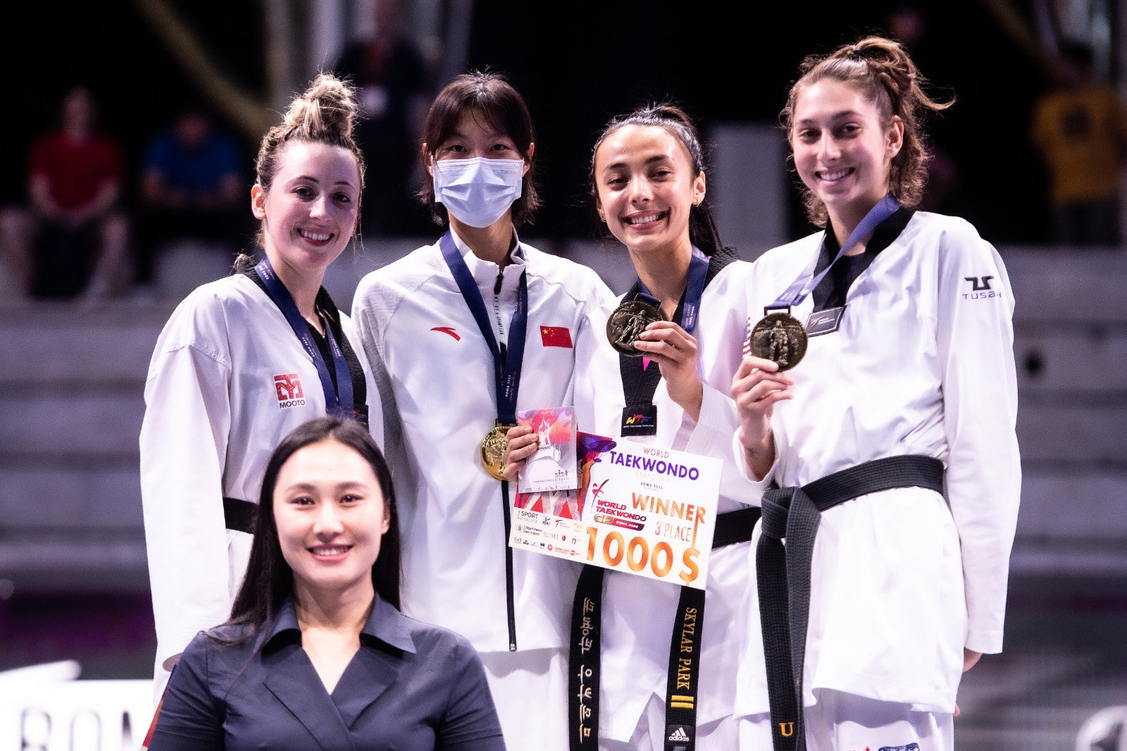 Zongshi Luo, second from right, beat double Olympic champion Jade Jones, left, to take the only women's gold available today in Rome ©World Taekwondo