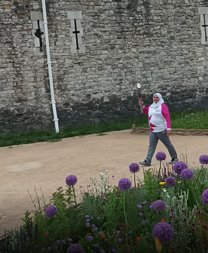Rougie Khanom carried the Baton through the "Superbloom" at the Tower of London ©ITG