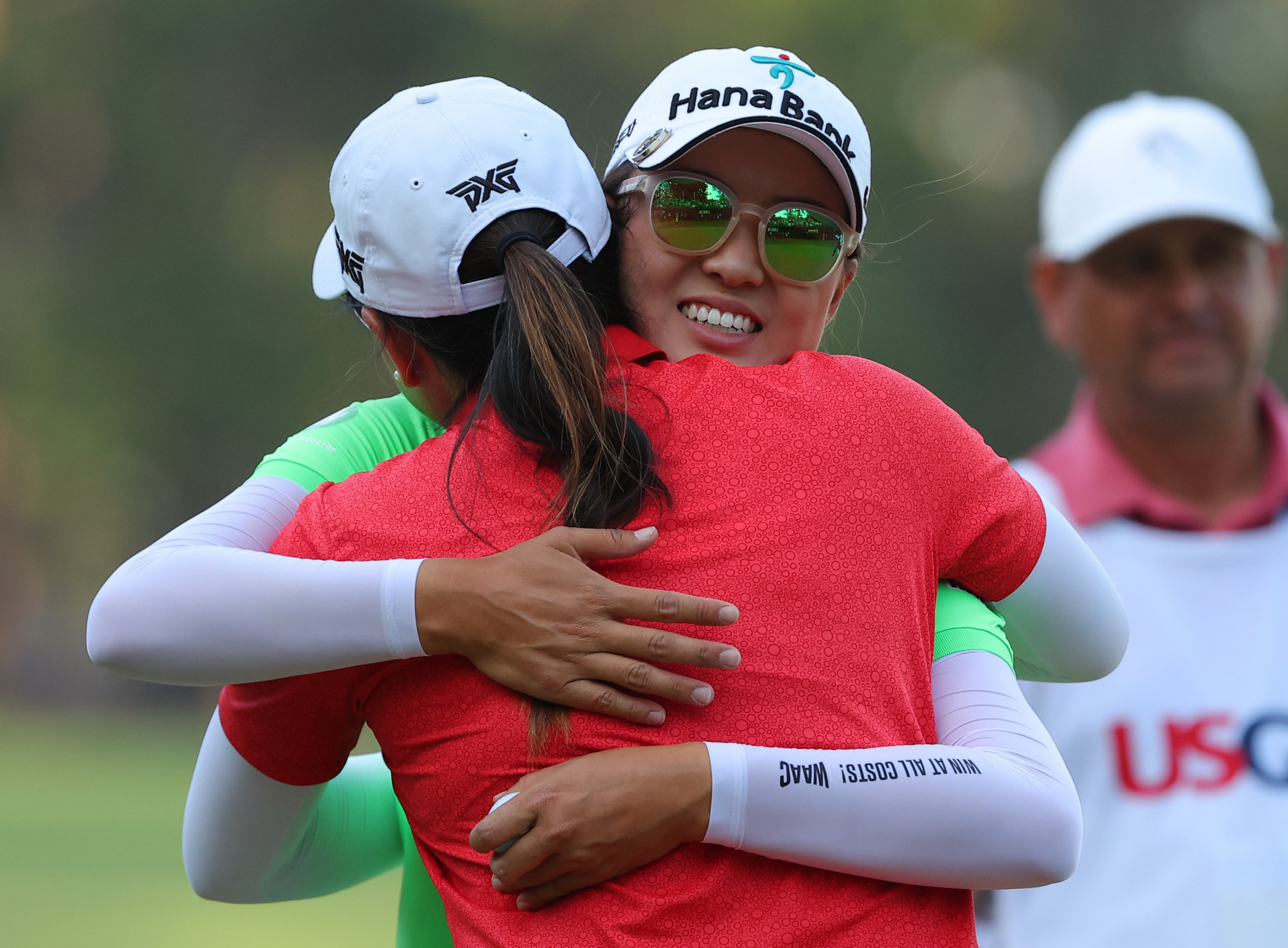 Mina Harigae congratulates Minjee Lee of Australia after her victory at the US Women's Open at Pine Needles Lodge and Golf Club ©Getty Images