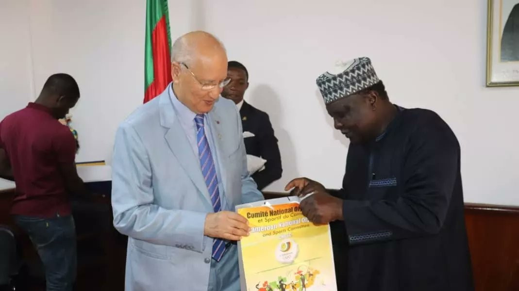 Cameroon National Olympic and Sports Committee President Hamad Kalkaba Malboum, right, has held talks with African Sambo Confederation counterpart Dalil Scalli ©Twitter/camnosc