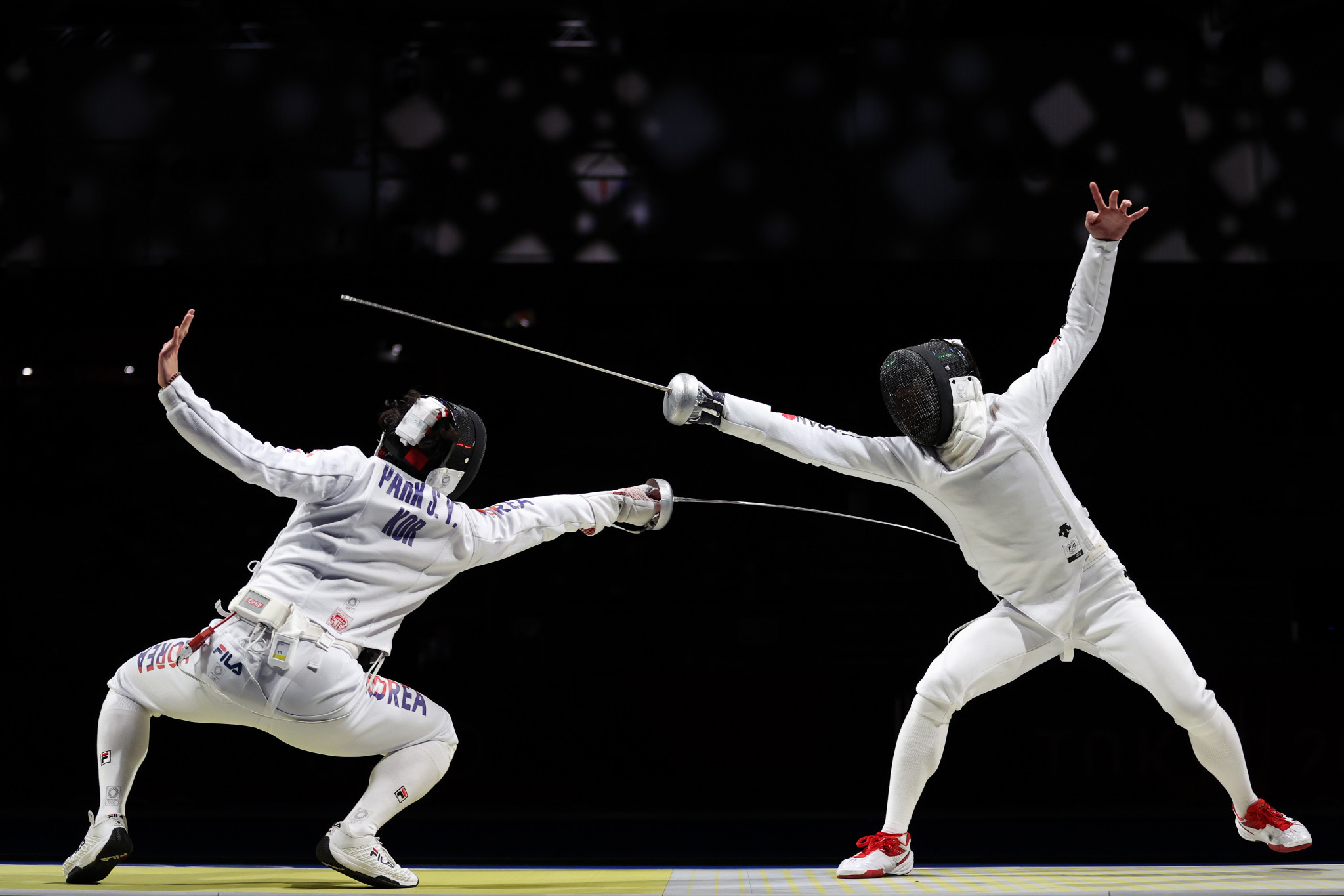 Koki Kano, right, won gold in the men's épée tournament at the Asian Fencing Championships ©Getty Images