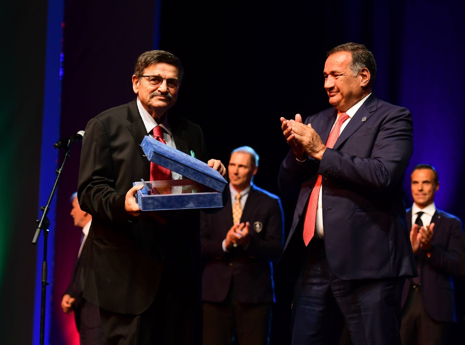 MOK President from 1992 until 2020 Vasil Tupurkovski, left, received a commemorative gift as part of the 30th anniversary celebrations ©EOC