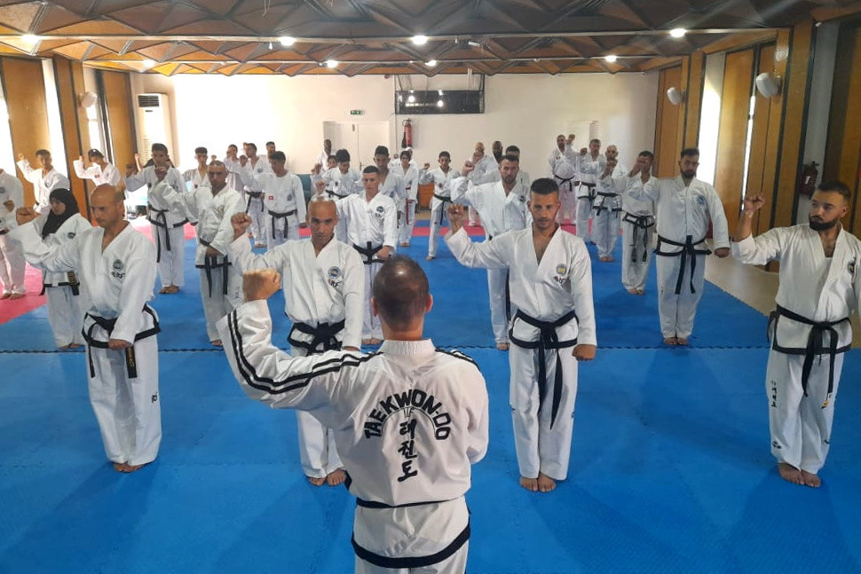Grand Master Pierre Laquerre teaching technical details at the in-person seminar in Arabic ©ITF