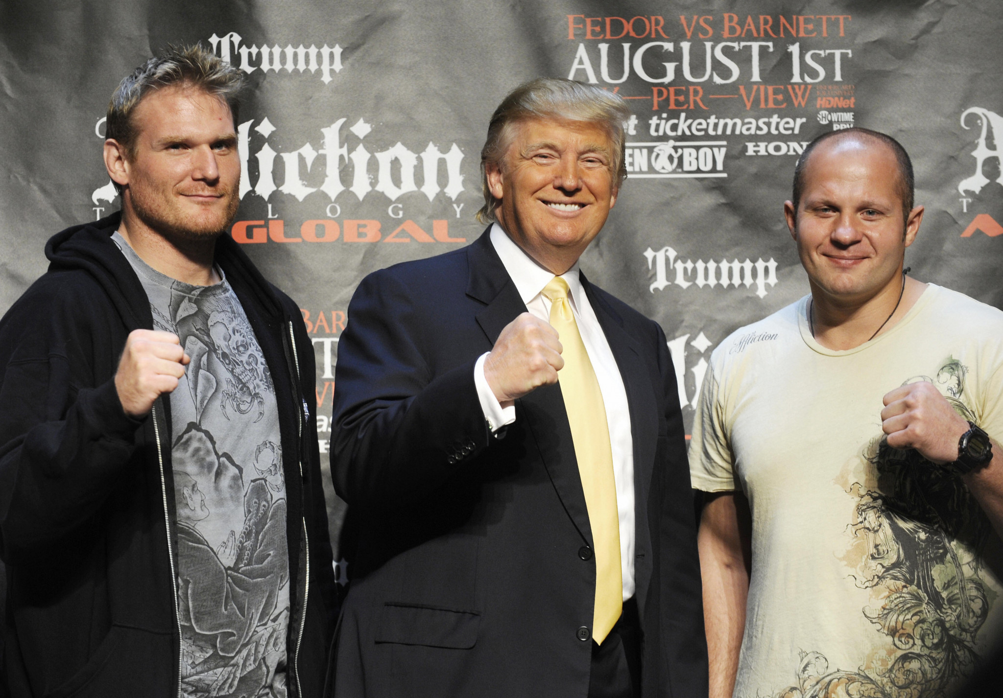 Fedor Emelianenko, right, next to future American President Donald Trump in 2009, has enjoyed a superb career in MMA and sambo ©Getty Images
