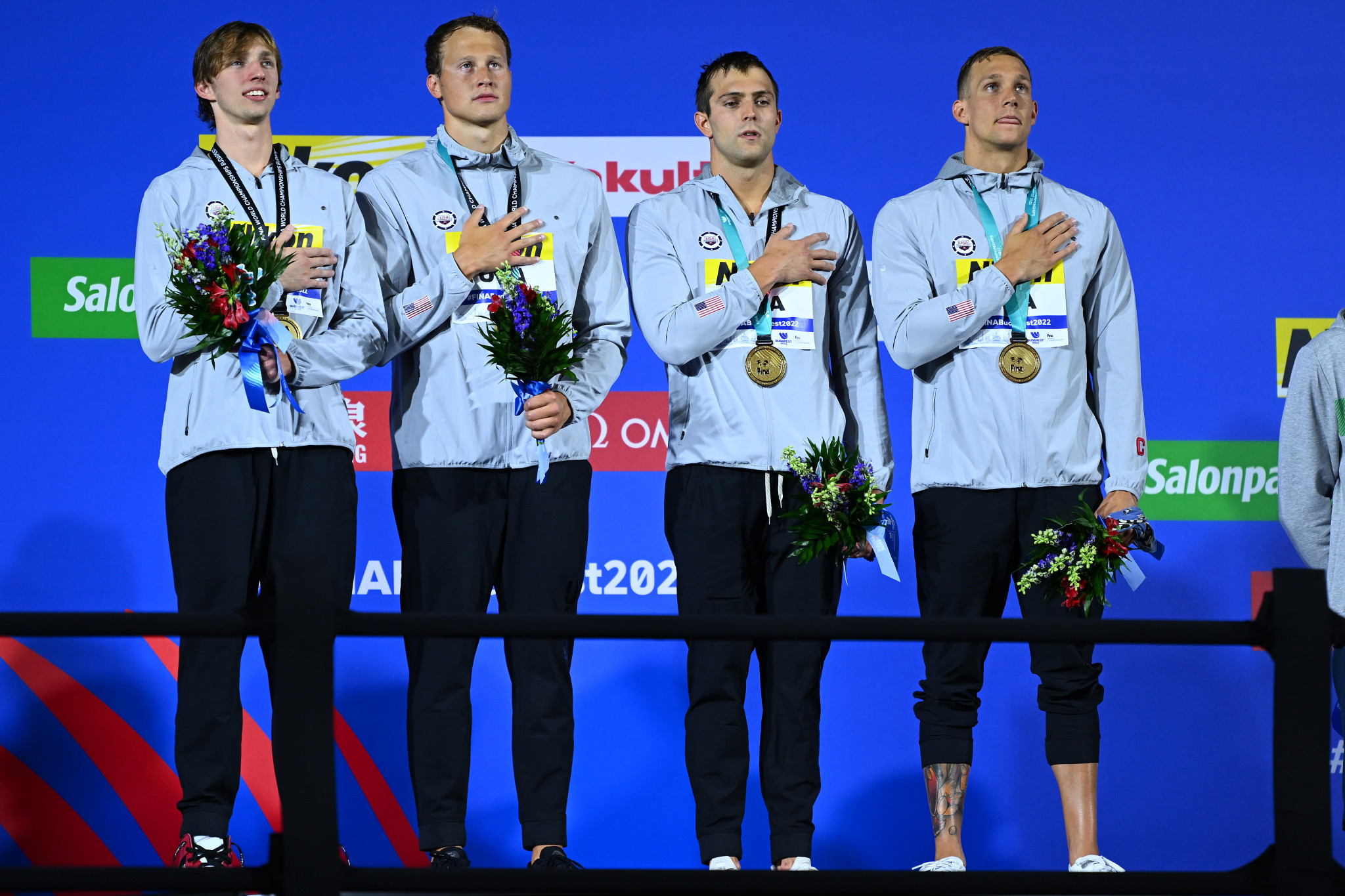 Brooks Curry, furthest left, Justin Ress, second left, Ryan Held, second right, and Caeleb Dressel, furthest right, collected gold for the US in the men's 4x100m freestyle relay ©Getty Images