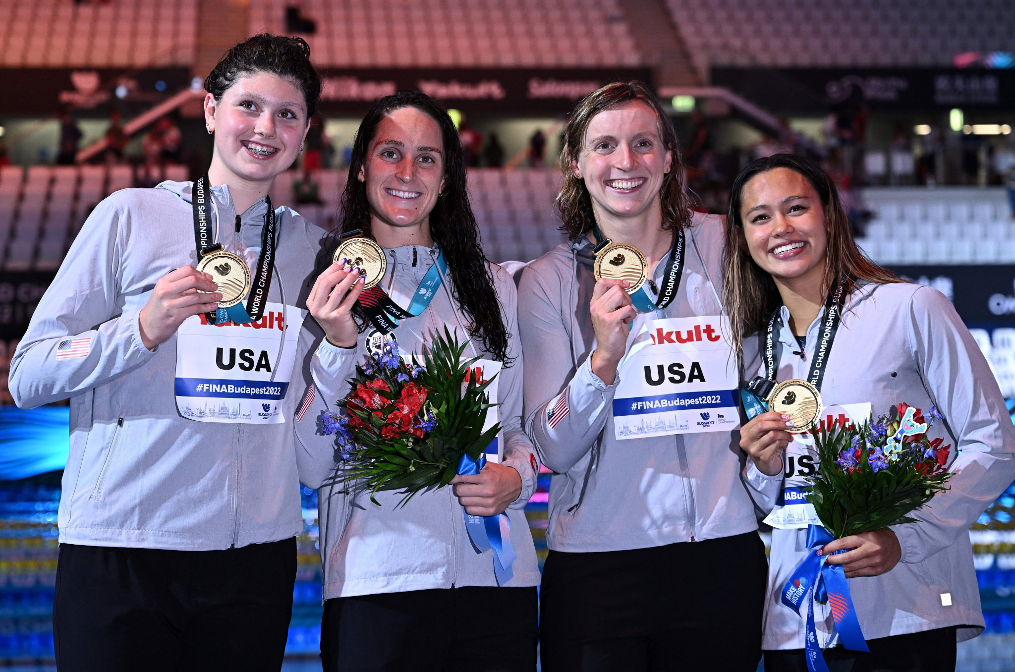 Claire Weinstein, furthest left, Leah Smith, second left, Katie Ledecky, second right and Bella Sims, furthest right, set a women's 4x200m freestyle relay Championships record time of 7:41.45 for the United States ©Getty Images
