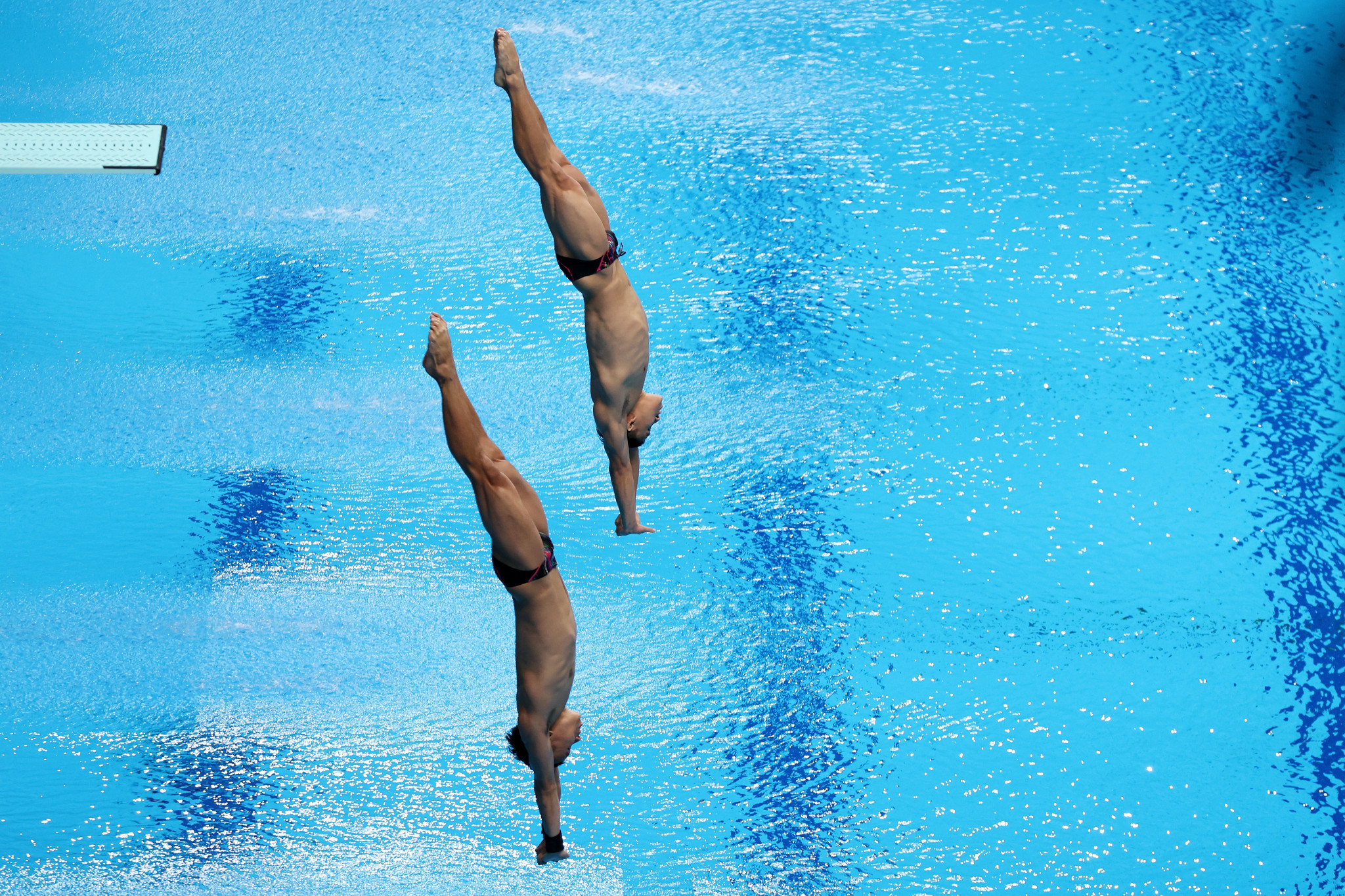 Britain's Anthony Harding, left, and Jack Laugher, right, had to settle for silver despite topping the scoring in the final two rounds of the men's 3m synchronised final ©Getty Images