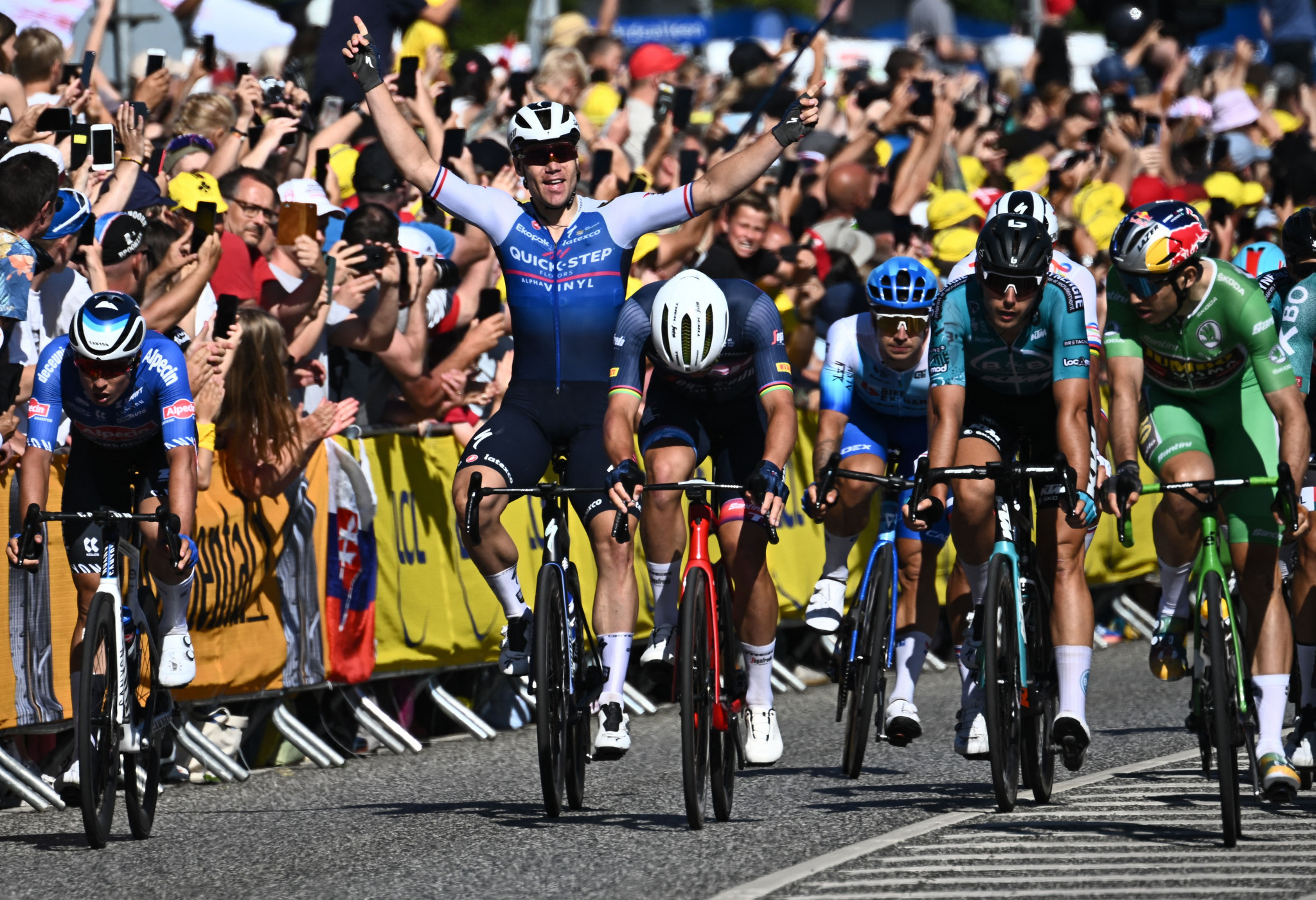 Jakobsen wins thrilling stage two as van Aert takes Tour de France yellow jersey