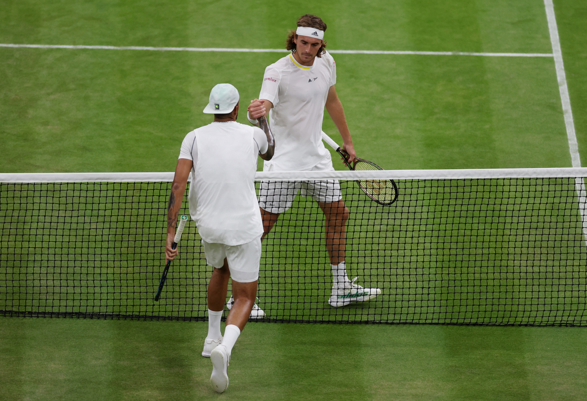 Stefanos Tsitsipas called Nick Kyrgios a "bully" after his match, extending a quick handshake before leaving the court ©Getty Images