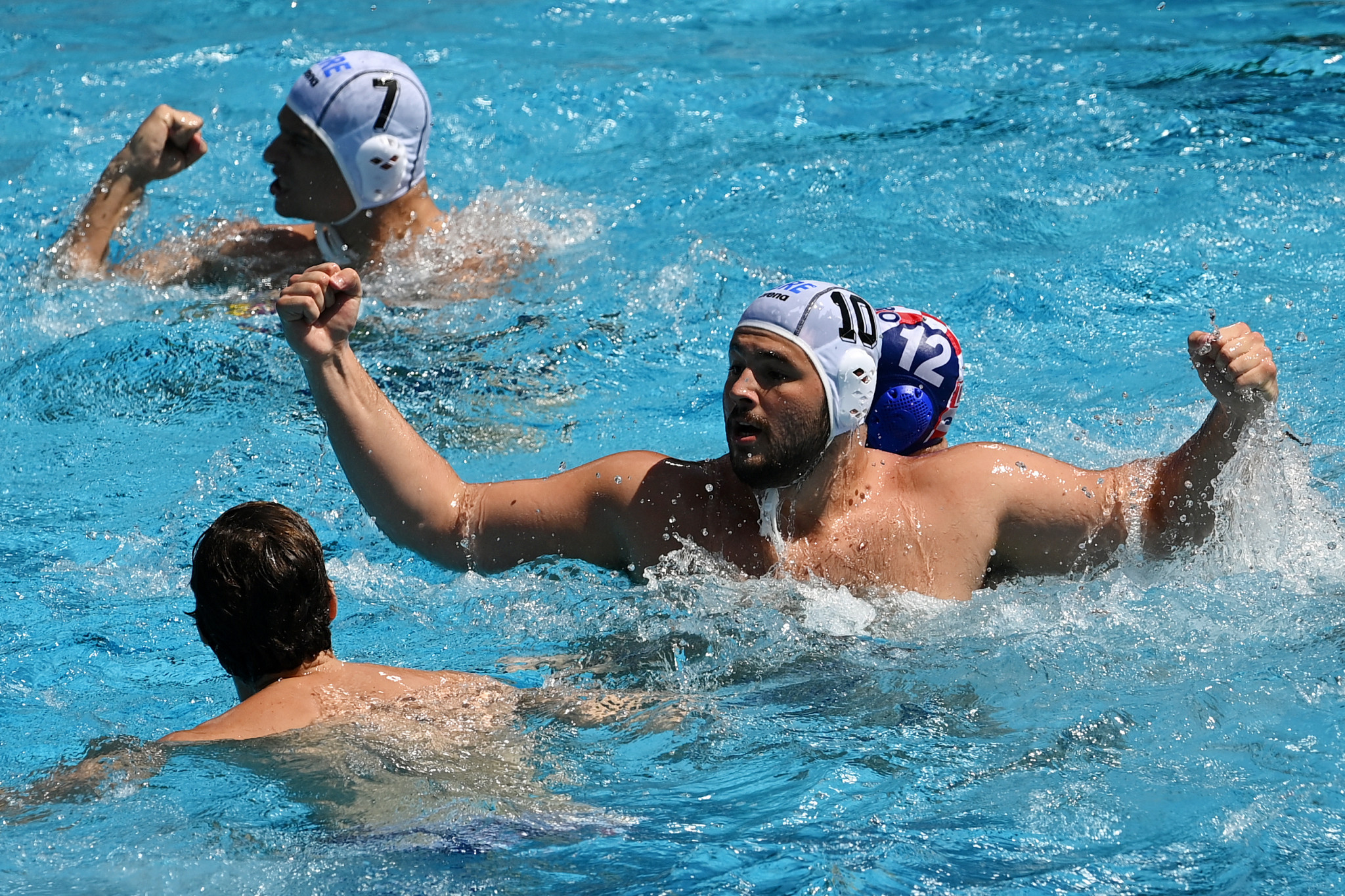 Konstantinos Kakaris, second right, scored three times for Greece to ensure they won the bronze medal match 9-7 against Croatia ©Getty Images