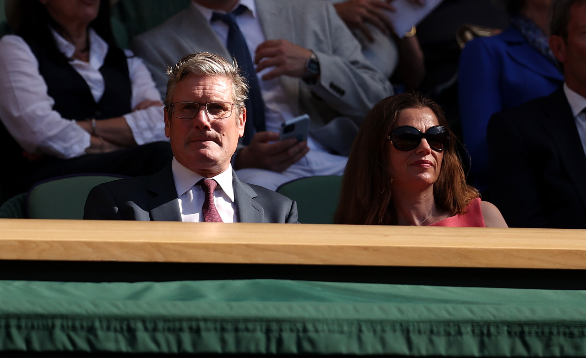 British opposition leader Sir Keir Starmer, left, attended the women's singles semi-final between Ons Jabeur and Tatjana Maria ©Getty Images