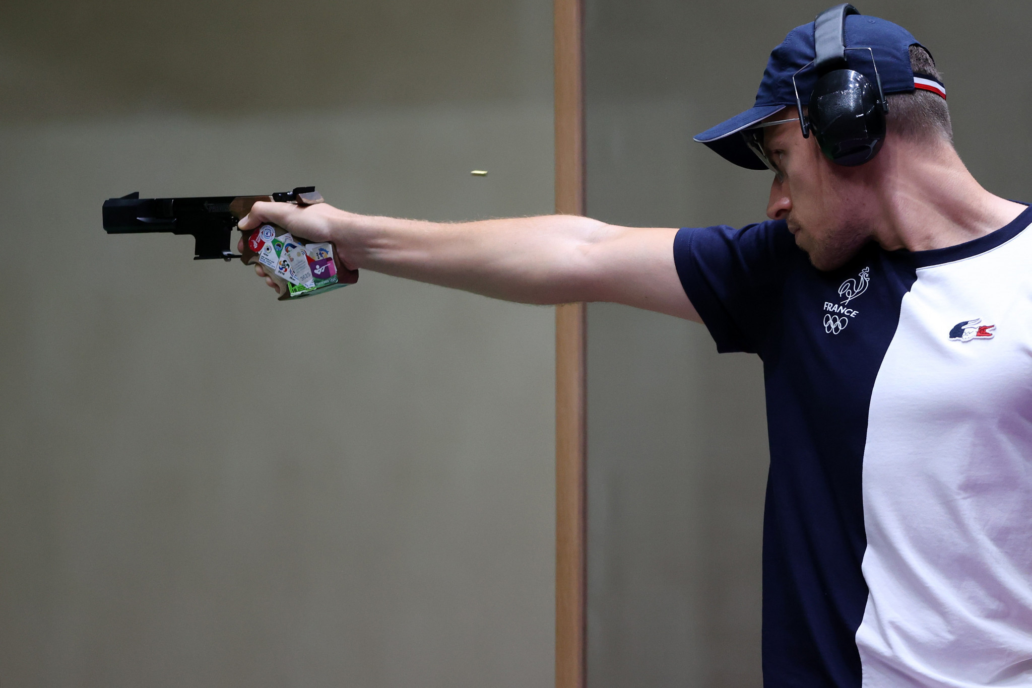 Olympic gold medallist Jean Quiquampoix helped France to defend their 25m rapid fire pistol men's team title ©Getty Images