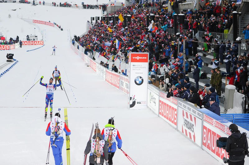 Martin Fourcade held off German rival Simon Schempp in the final leg to secure the title