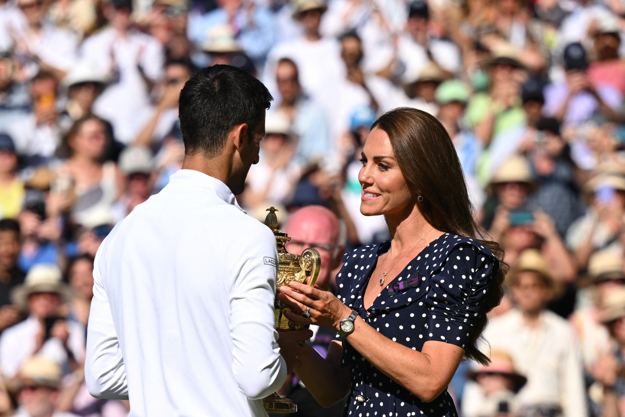 Catherine Middleton, the Duchess of Cambridge, right, handed Djokovic the Wimbledon trophy ©Getty Images