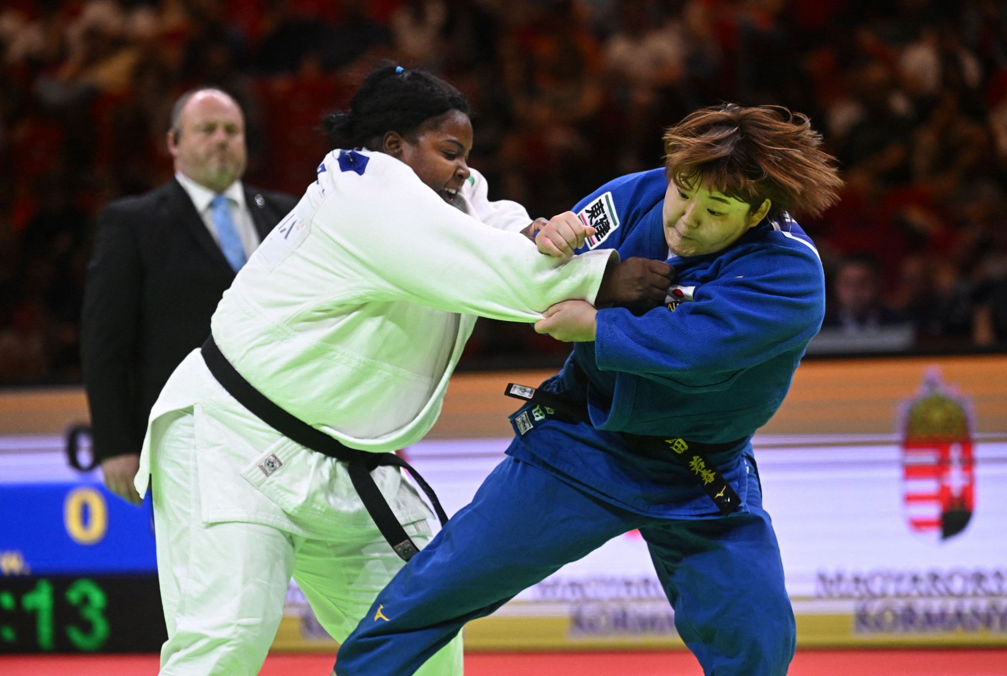 Wakaba Tomita, right, won the women's over-78kg class after bettering Idalys Ortiz, left ©Getty Images