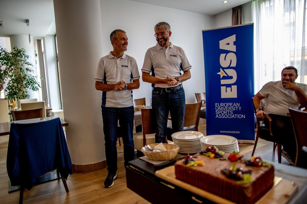 EUSA secretary general Matjaž Pečovnik, left, and first vice-president Haris Pavletić, right, celebrated the European Universities Games' 10-year anniversary with cake and speeches ©EUSA