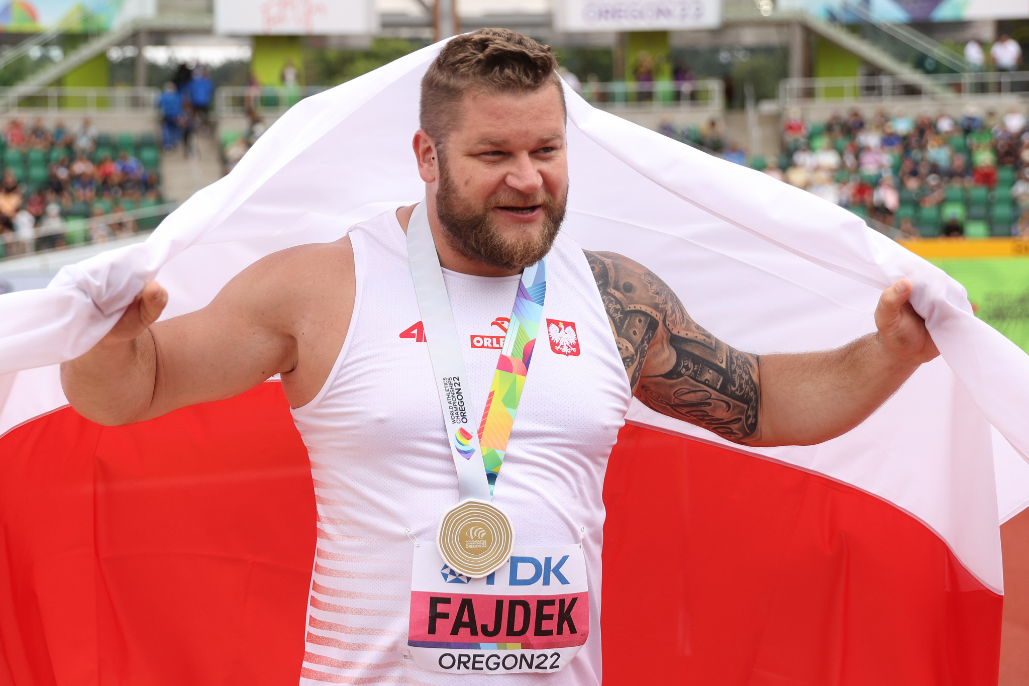 Poland’s Pawel Fajdek celebrates winning a record fifth consecutive gold medal in the hammer at the World Championships in Eugene ©Getty Images