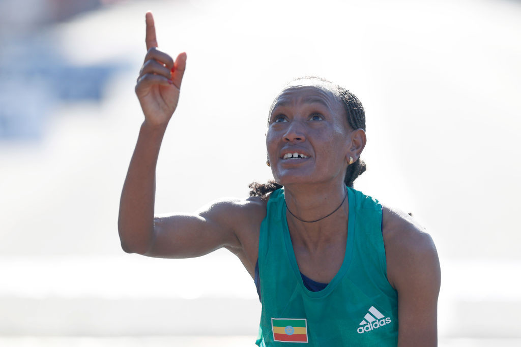 Gebreslase matches Tola as she wins world marathon title for Ethiopia in Championship record