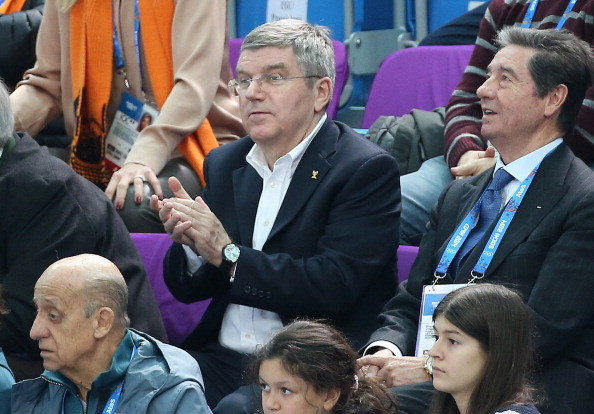 IOC President Thomas Bach, centre, described Ottavio Cinquanta, right, as an 