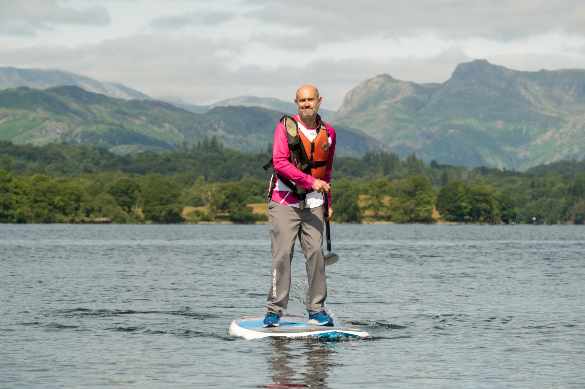 The Baton was brought across Lake Windermere by paddleboard ©Birmingham 2022/Getty Images