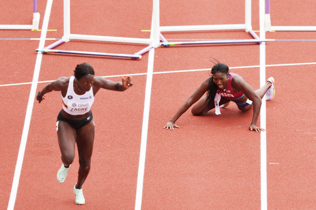 Defending champion Nia Ali, right, of the United States crashed out in the women's 100m hurdles heats ©Getty Images