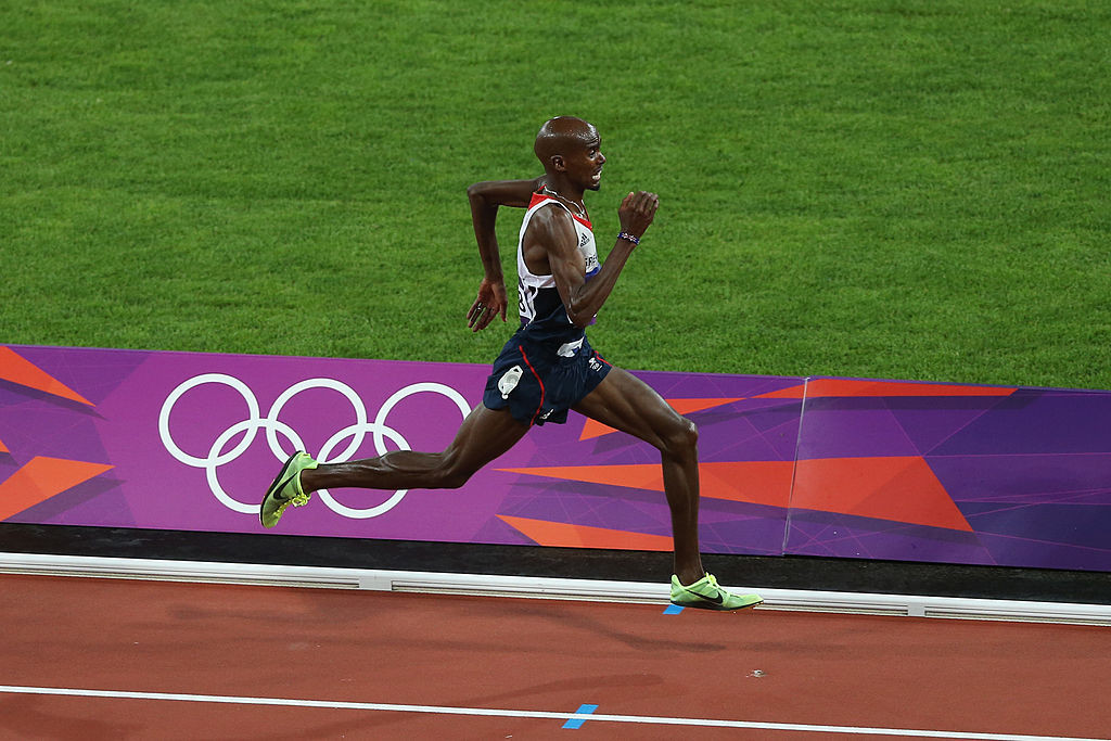 Mo Farah en route to 10,000m gold on the night when British athletes won three golds at the London 2012 Olympics ©Getty Images