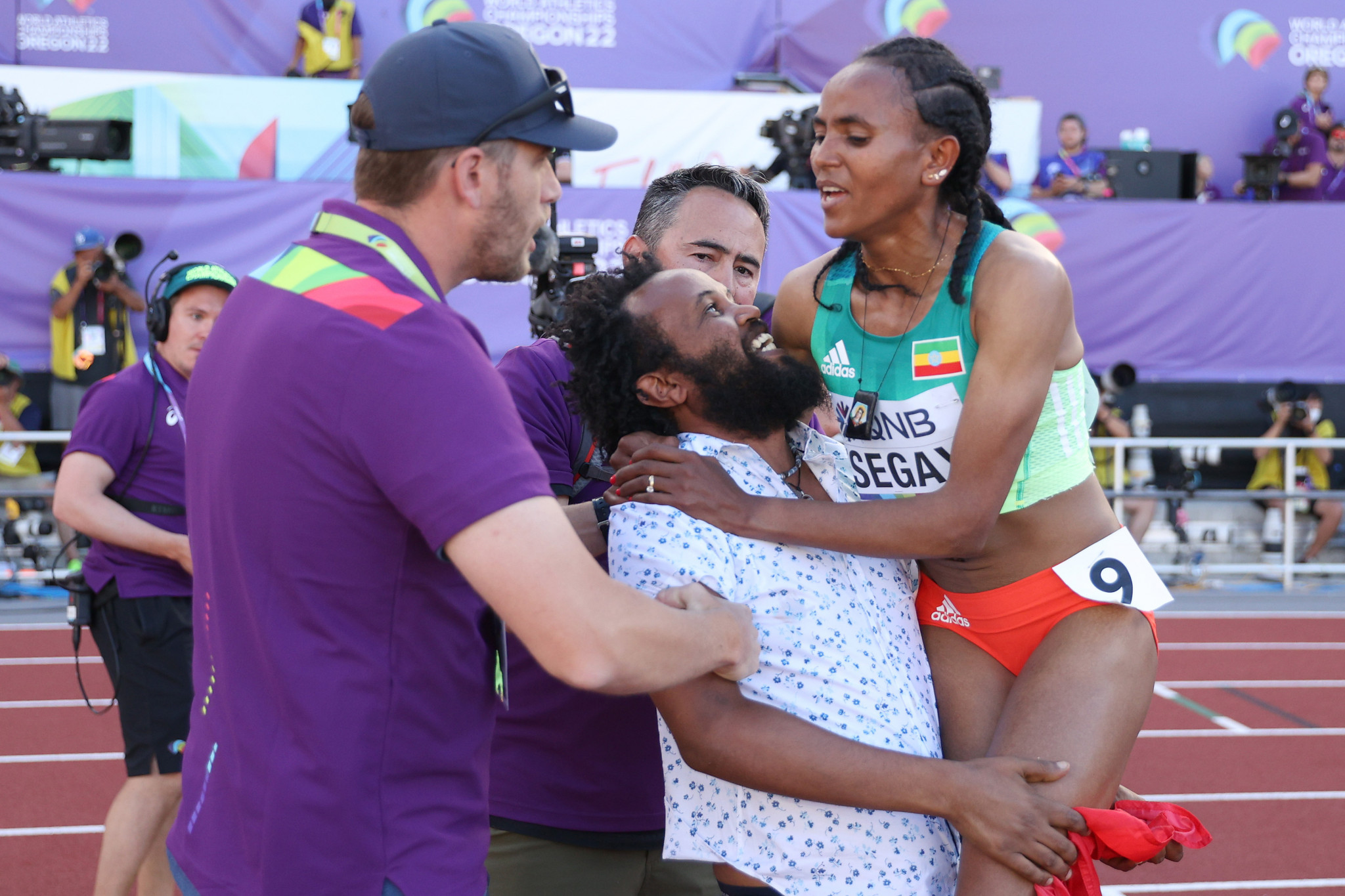 A spectator tried to lift Tsegay after she won gold in the Women's 5,000m ©Getty Images
