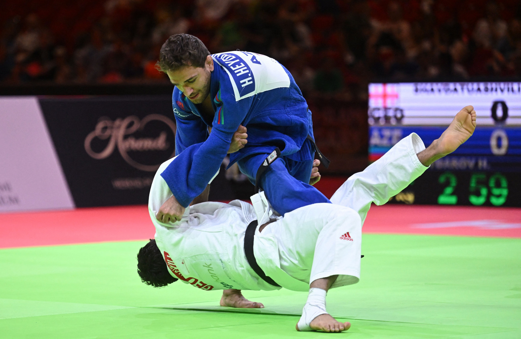 Hidayat Heydarov, top, won gold in the men's under-73 kilograms category at the IJF Grand Slam in Budapest ©Getty Images