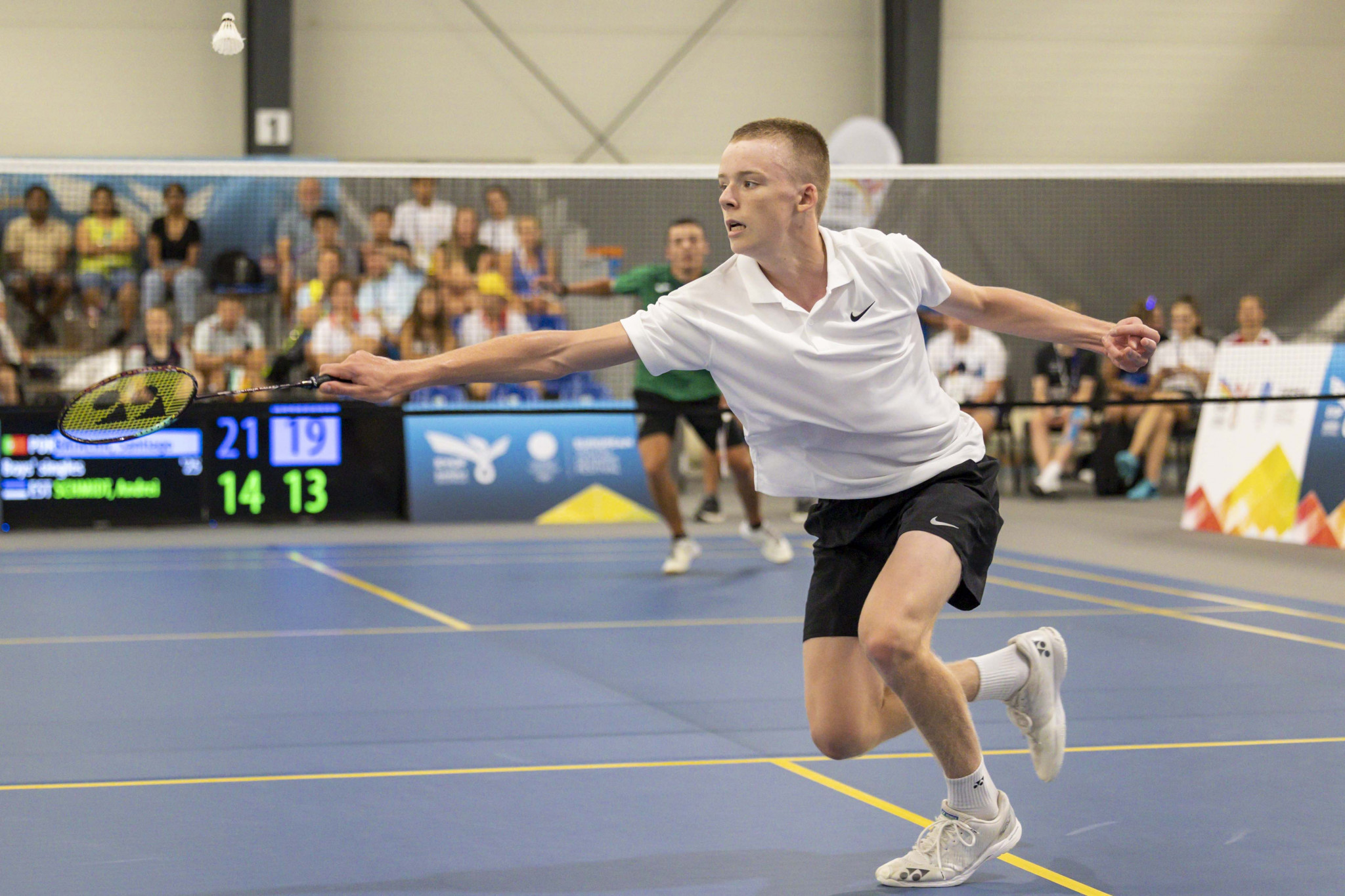Andrei Schmidt of Estonia, pictured, suffered a swift 21-14, 21-19 loss to Portugal's Santiago Batalha in the boys' badminton singles competition ©EOC