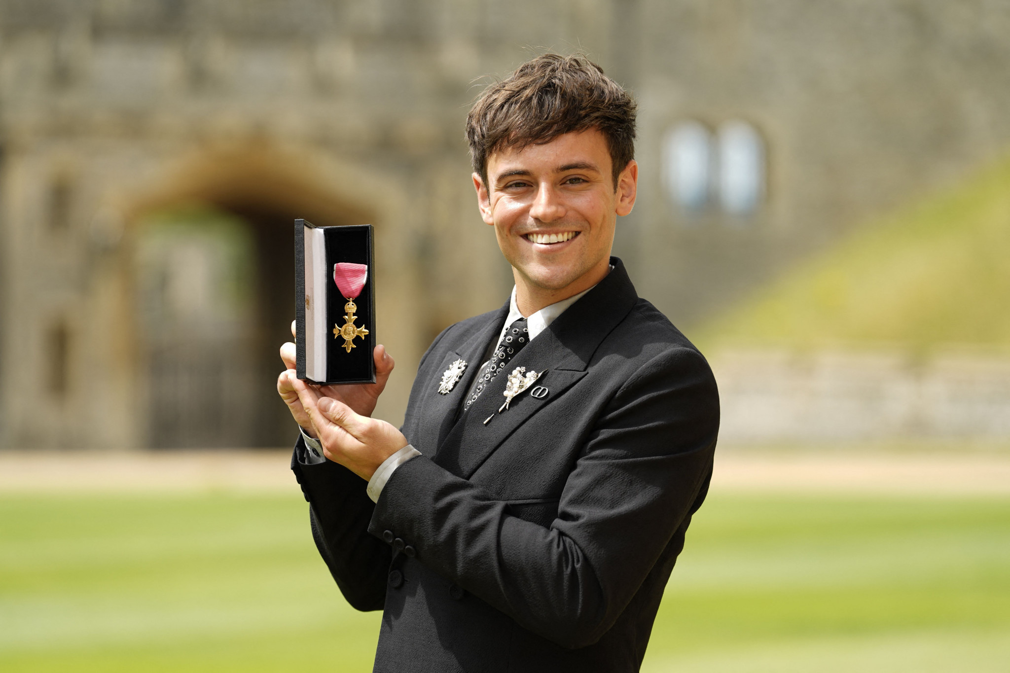 Tom Daley received the insignia of Order of the British Empire earlier this month ©Getty Images