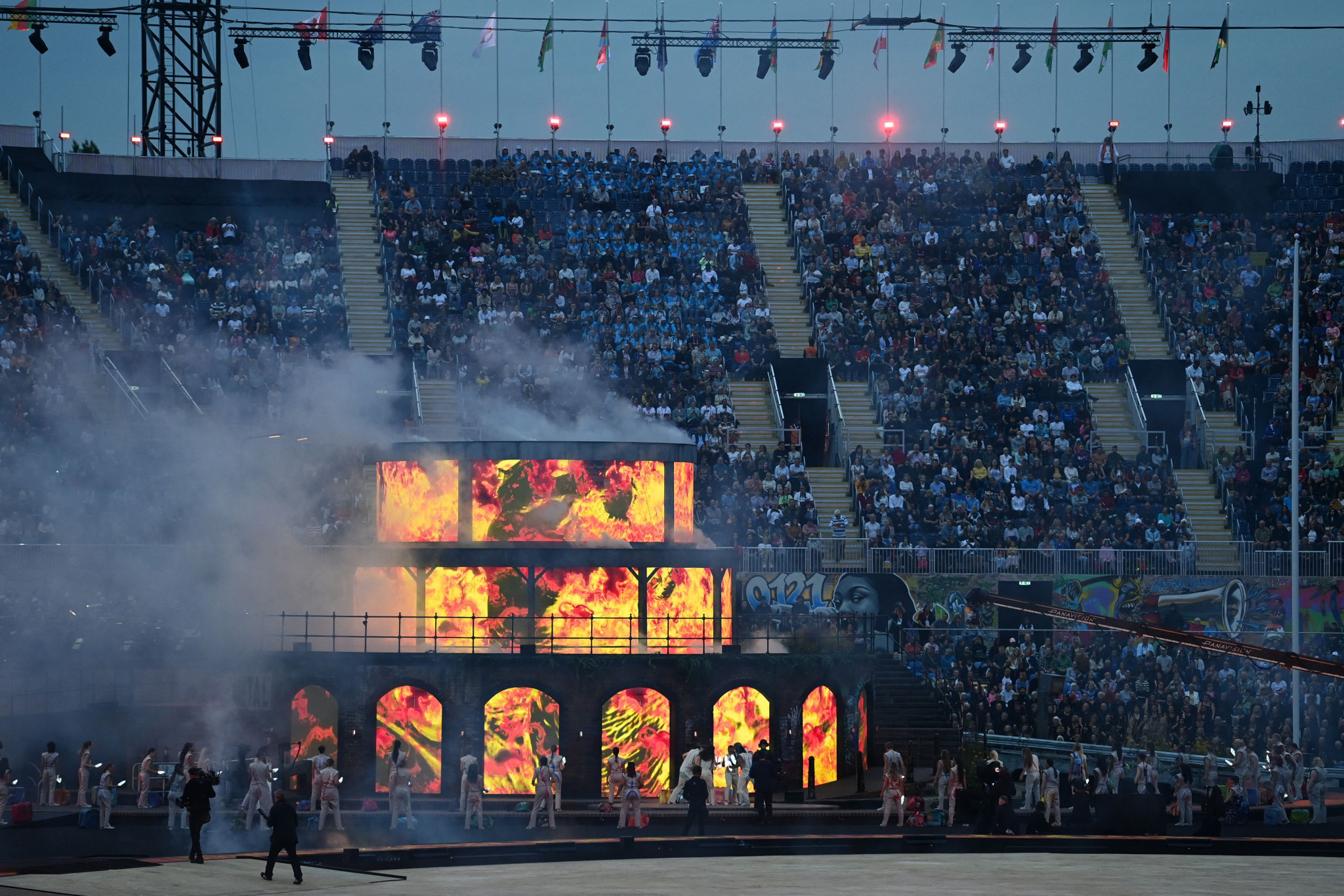 The Opening Ceremony was based around the characters Stella and the Dreamers, whose performance included extinguishing flames at a building representing the library in Birmingham ©Getty Images