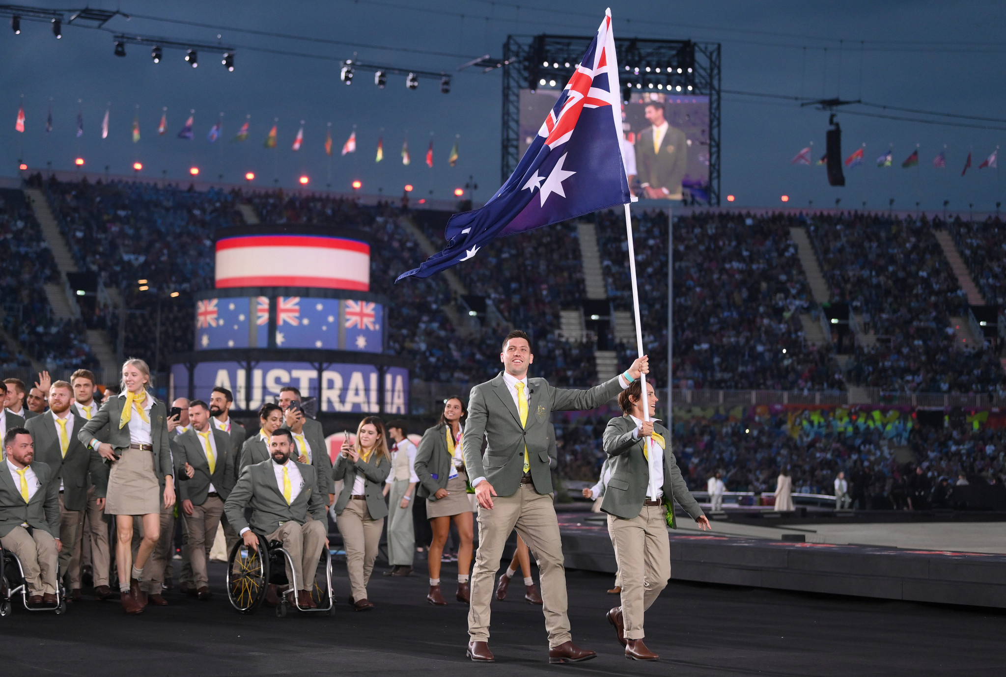 Australia were the first of the 72 nations to enter the Alexander Stadium during the Athletes Assembly, led by flagbearers Eddie Ockenden, left, and Rachael Grinham ©Getty Images