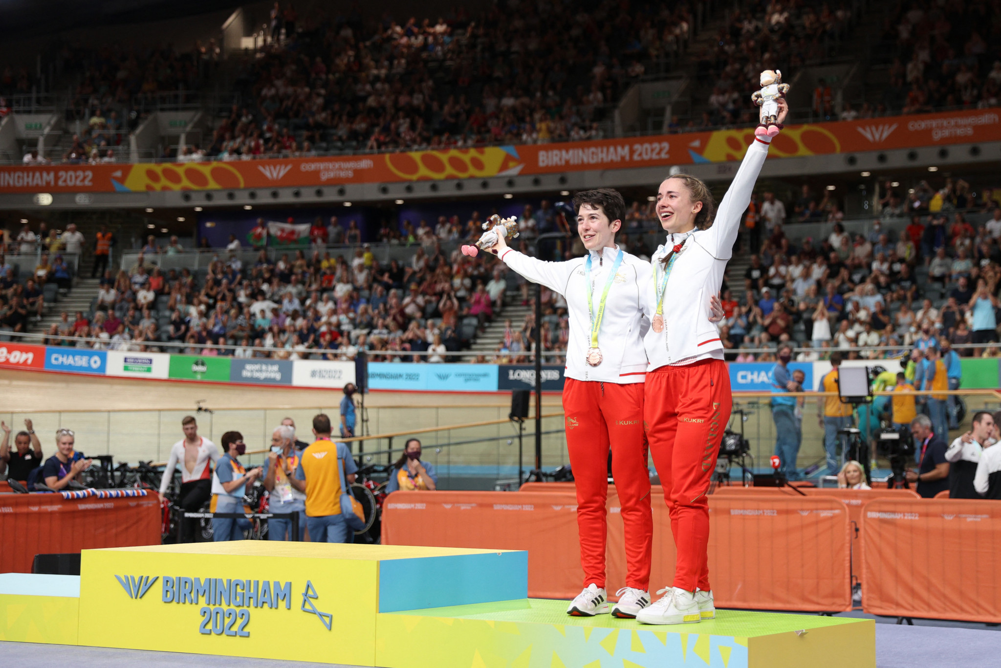 Sophie Unwin, left, and Georgia Holt, right, celebrating on the podium afterwards unofficially ©Getty Images