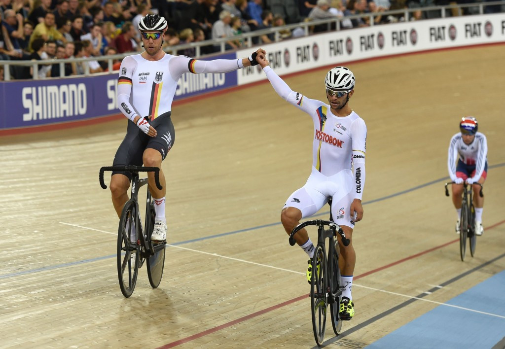 Fernando Gaviria (centre) defended his world omnium title with Germany's Roger Kluge (left) claiming silver