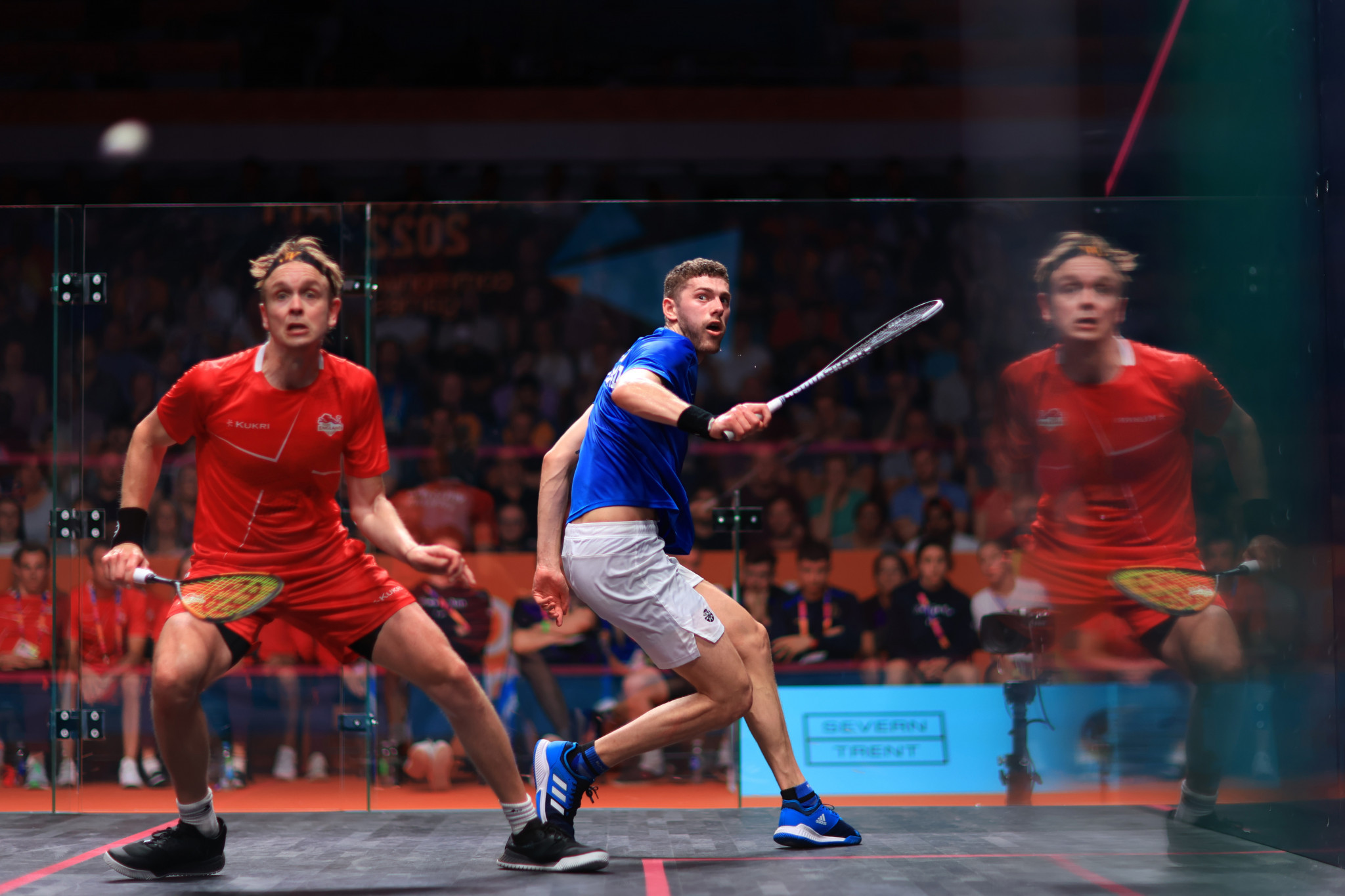 Gold Coast 2018 champion James Willstrop, left, beat Scotland's Rory Stewart in five games to reach the men's singles squash semi-finals ©Getty Images