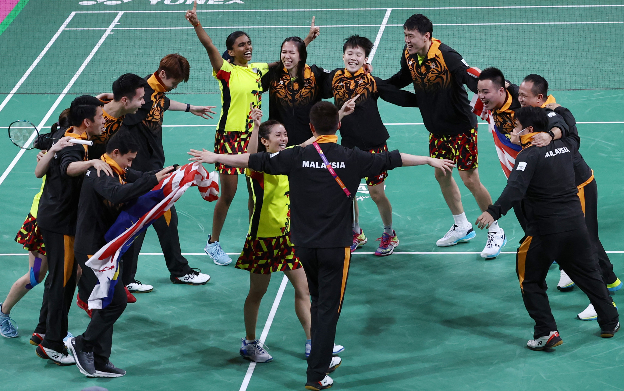 Malaysia were victorious in mixed team badminton, celebrating their gold medal afterwards ©Getty Images