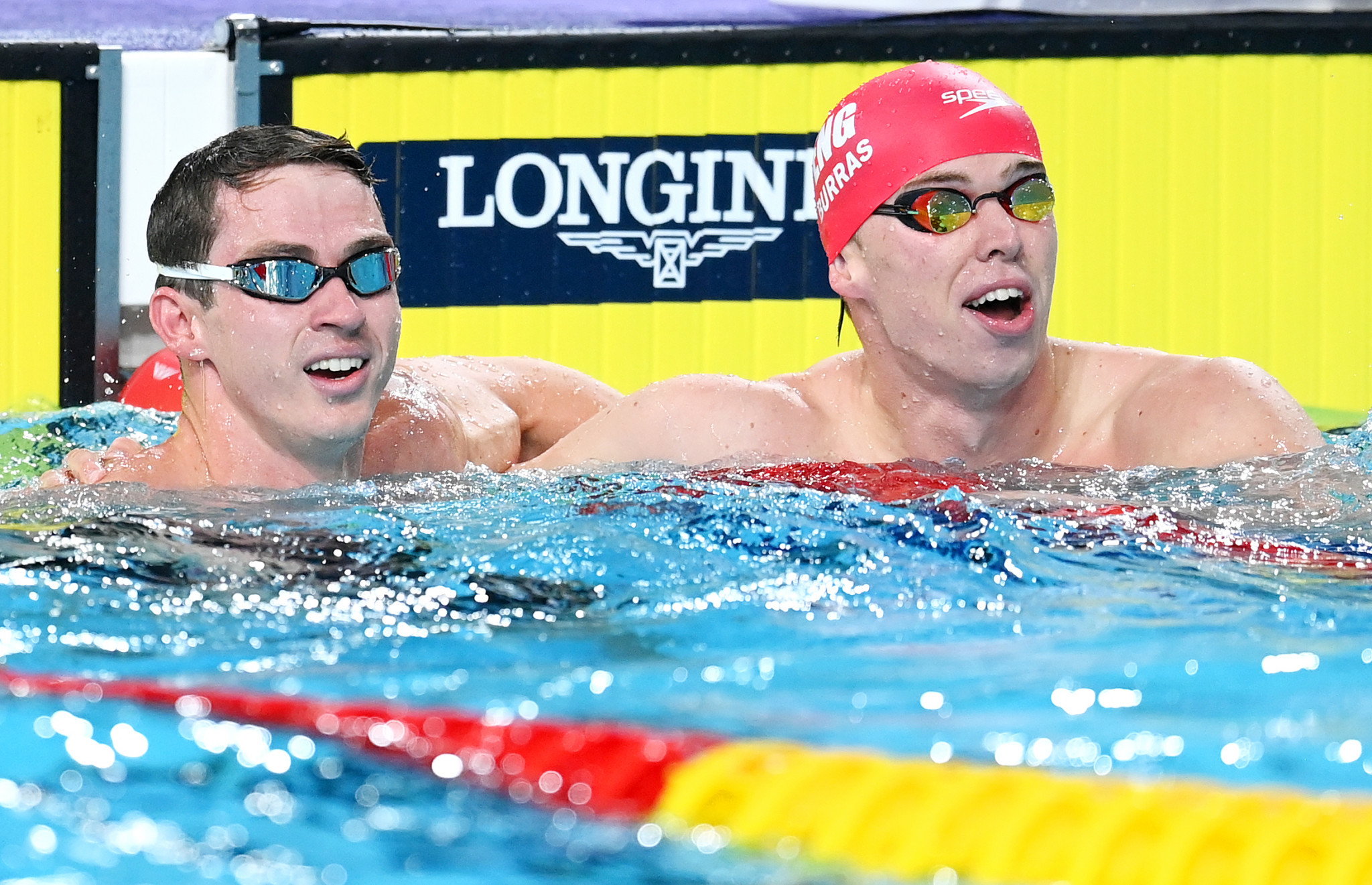 Ben Proud, left, celebrating his win with silver medallist Lewis Edward Burras ©Getty Images