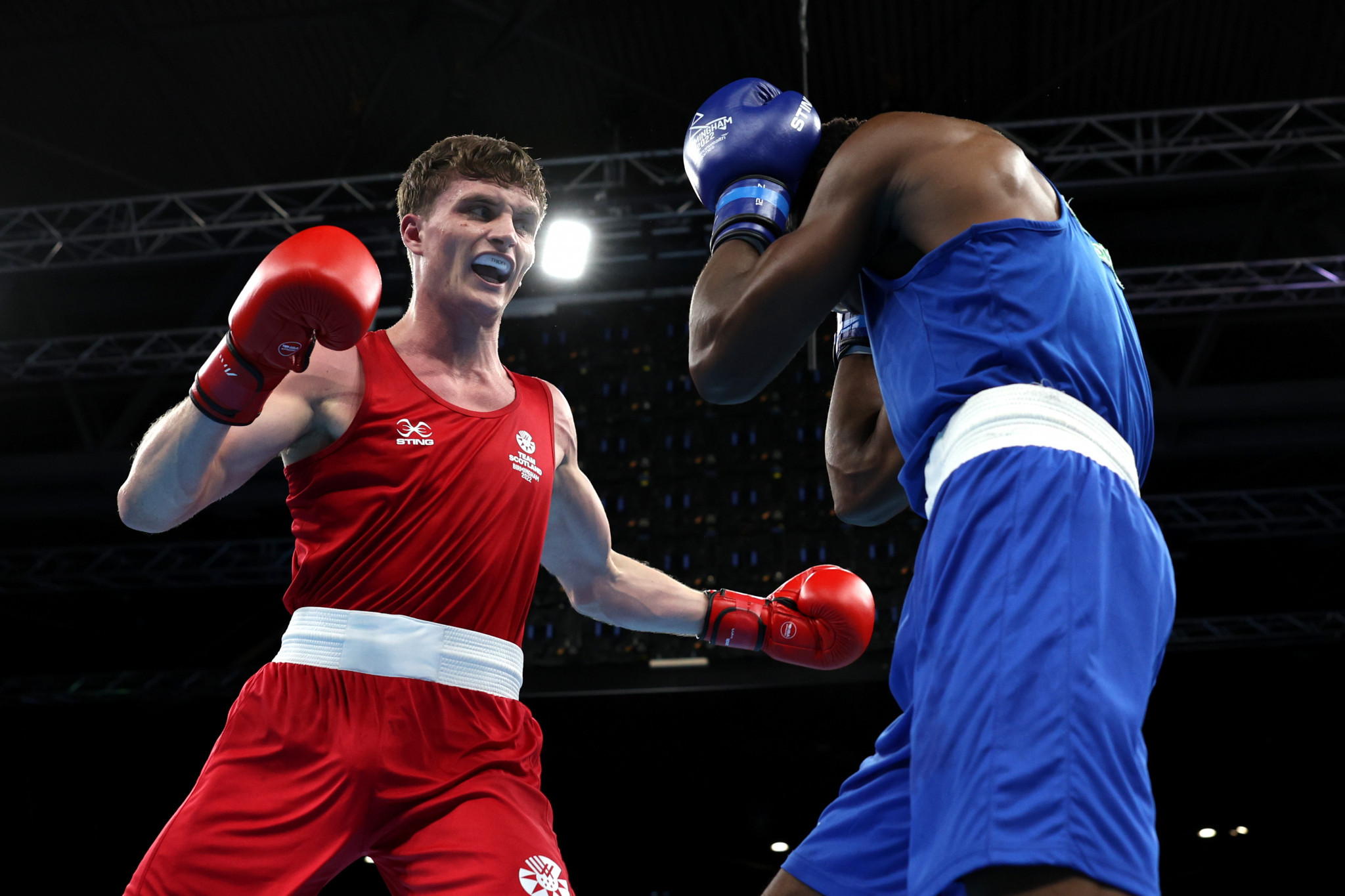 Sam Hickey, in red, was one of three Scots to advance to the boxing semi-finals today ©Getty Images